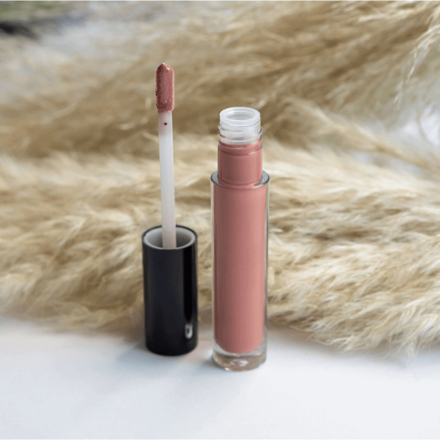 MIANIMED Premium Skincare Pink Lip Gloss with Wand on Natural Background