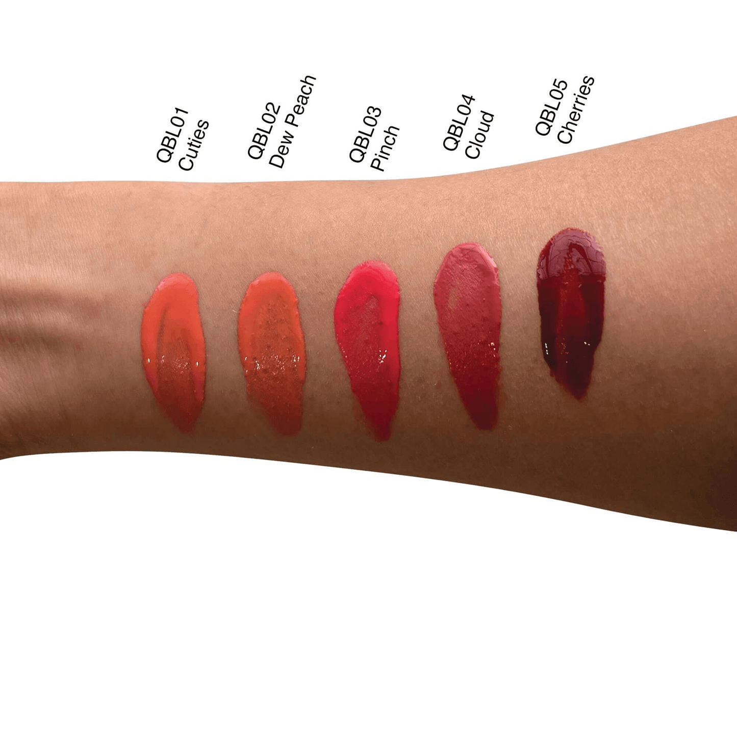 Swatches of five shades of MIANIMED premium skincare lip glosses on an arm, including QBL01 Cuties, QBL02 Dew Peach, QBL03 Pinch, QBL04 Cloud, and QBL05 Cherries.