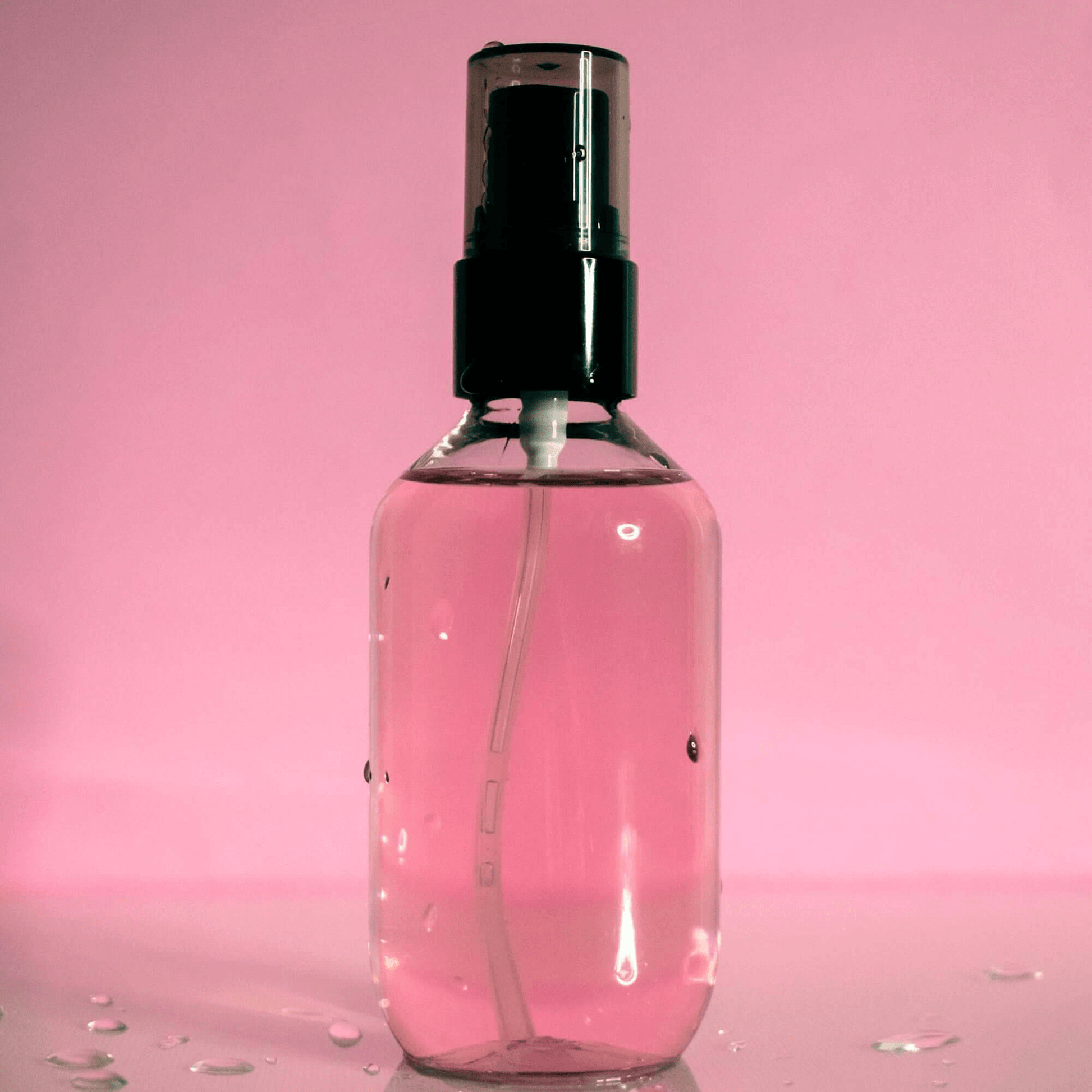 MIANIMED premium skincare spray bottle against a pink background