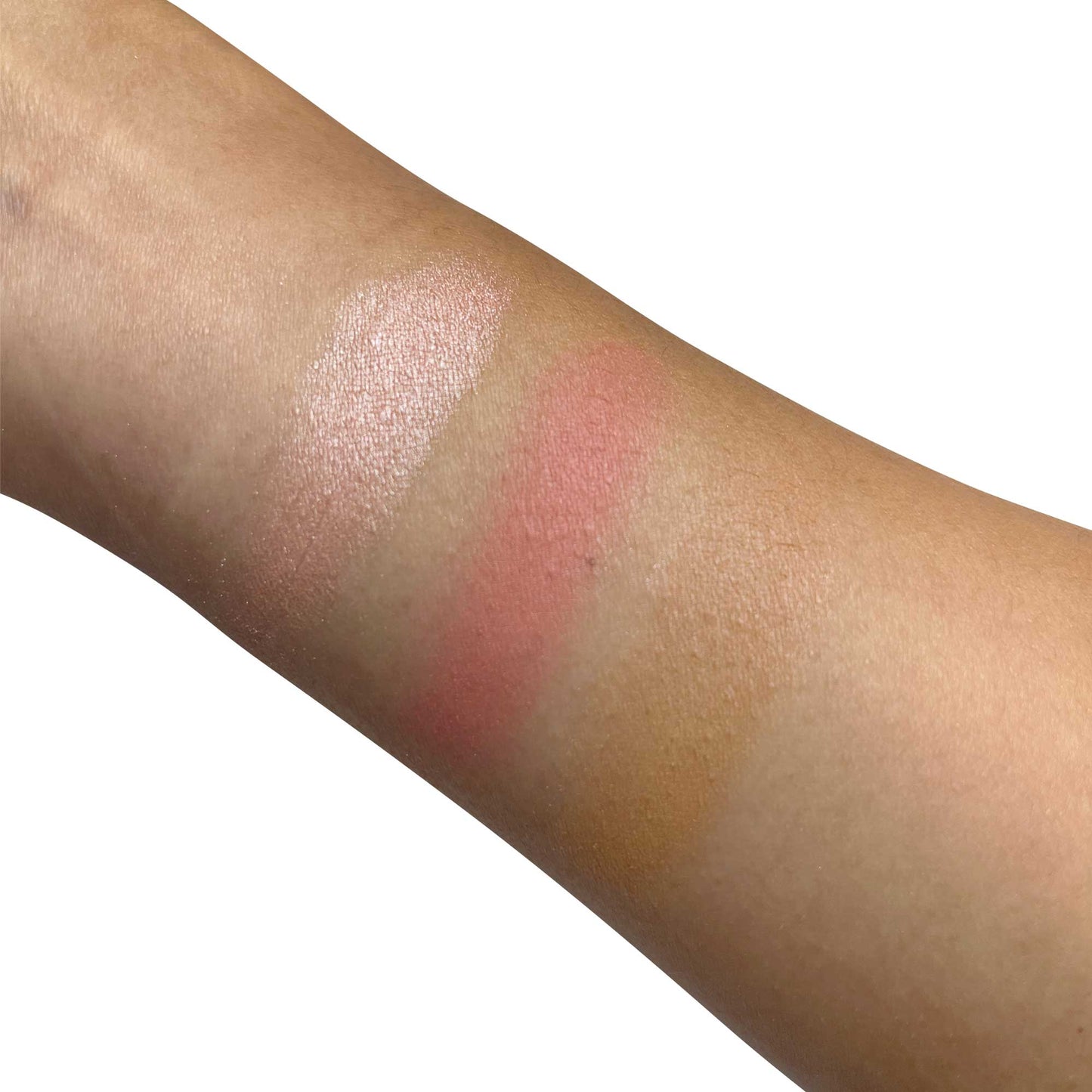 Swatches of MIANIMED Premium skincare products on an arm, showcasing different shades and textures.