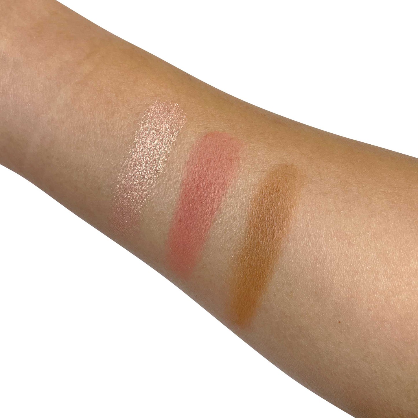 MIANIMED premium skincare swatches on arm showing three different shades of product