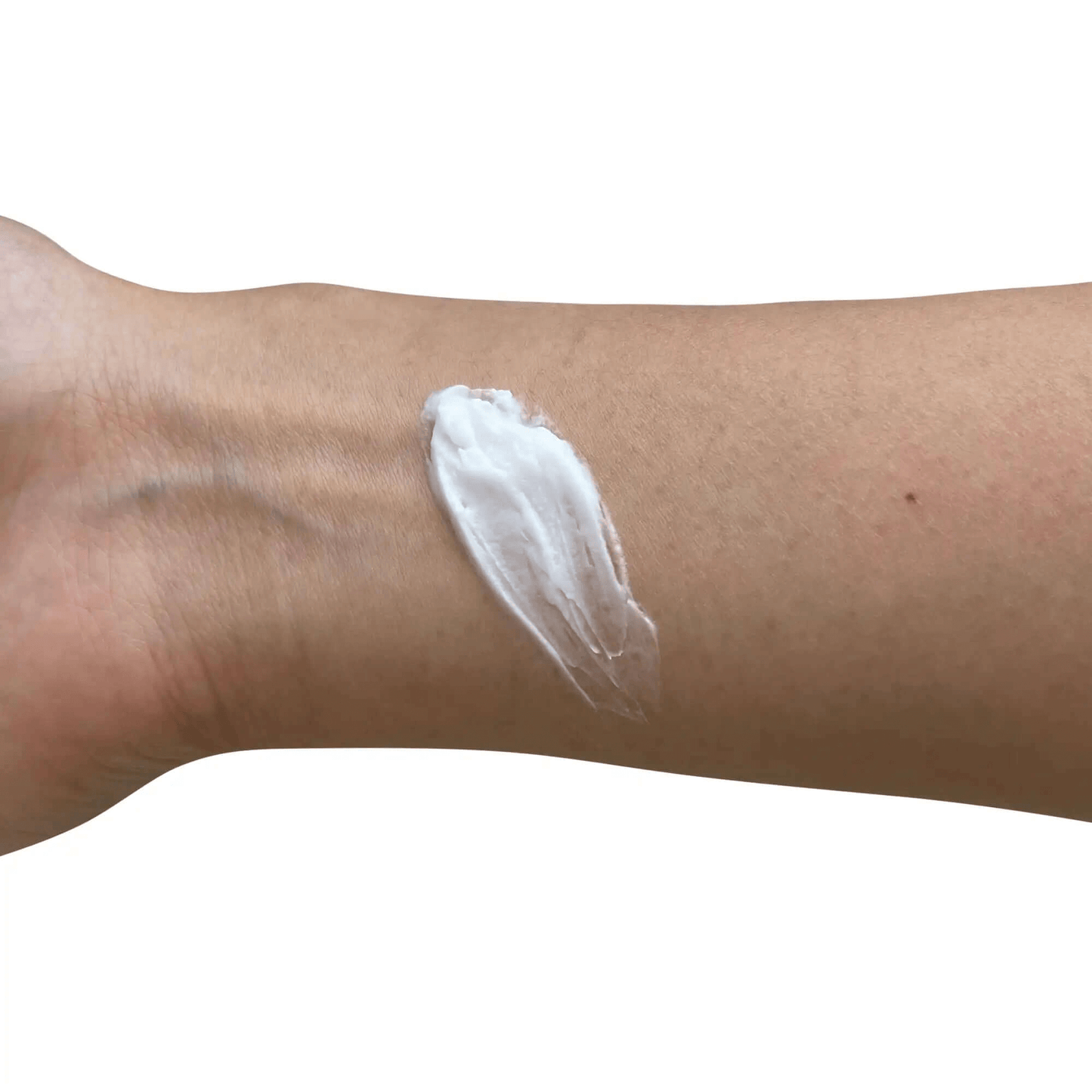 MIANIMED premium skincare lotion applied on a person's arm